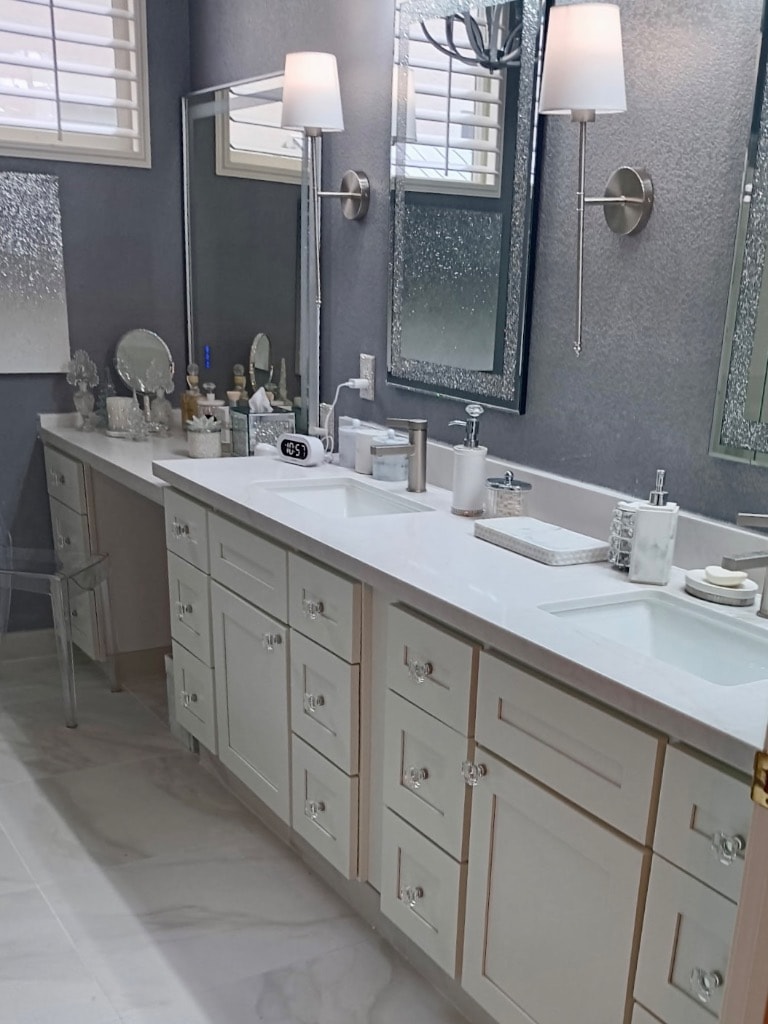 Master bathroom with dual vanity sinks, large mirrors, and custom cabinetry — quartz panel renovation by GT Home Solution in Pioneer, CA