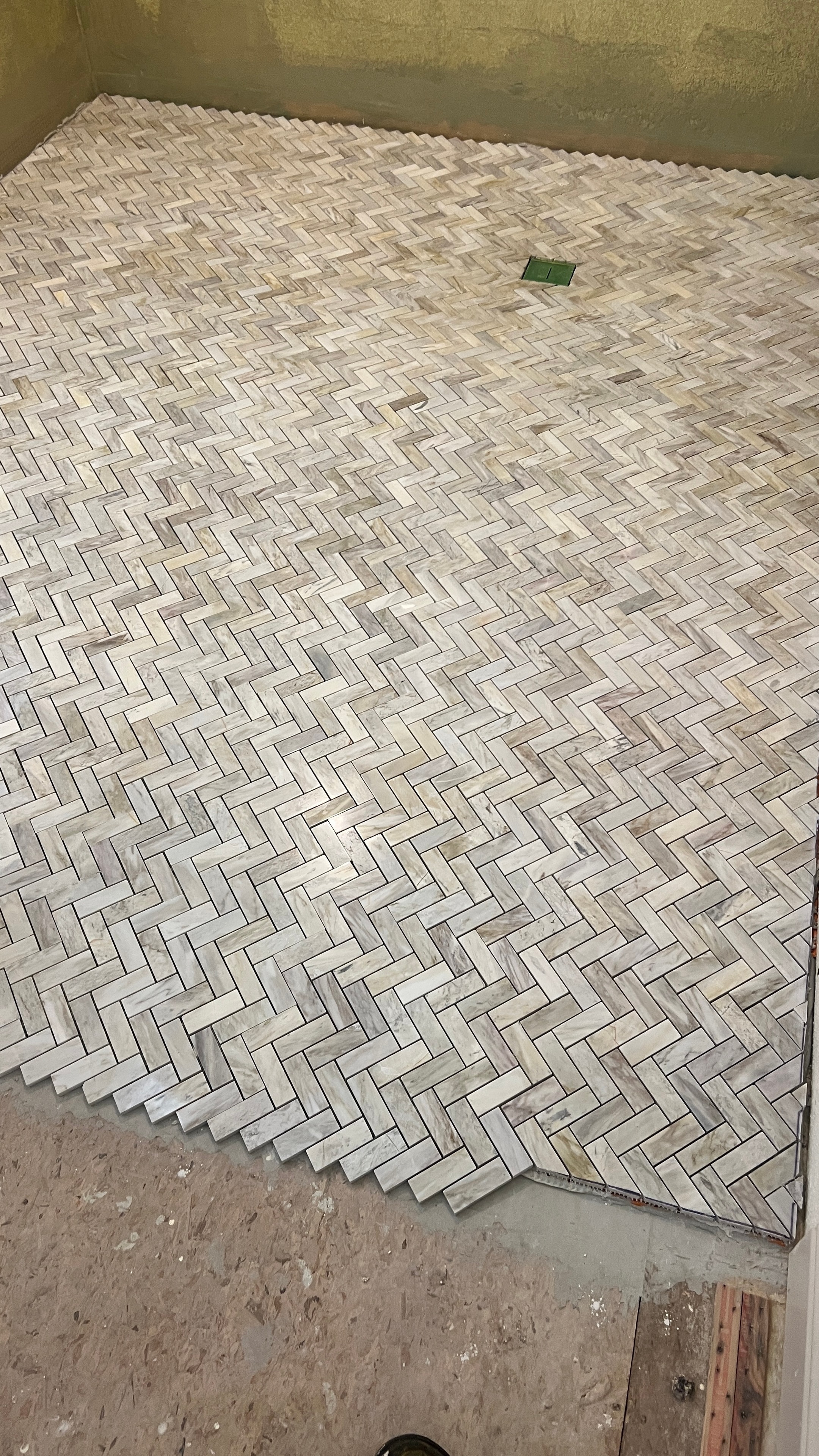 Custom herringbone tile flooring installation — travertine and stone tile work by GT Home Solution in Amador County, CA